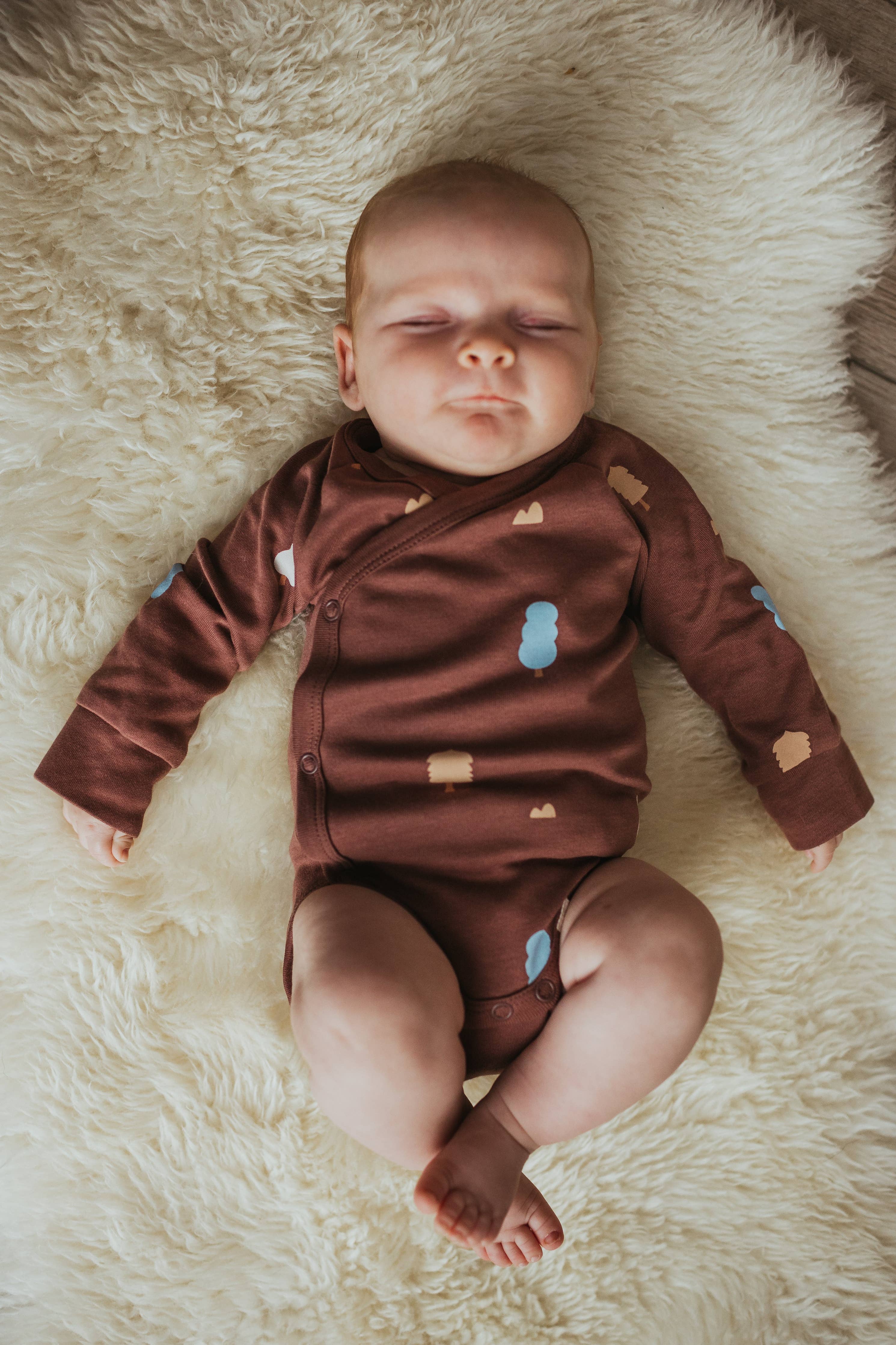 Organic Cotton Wrap Over Long Sleeve Bodysuit in Raisin